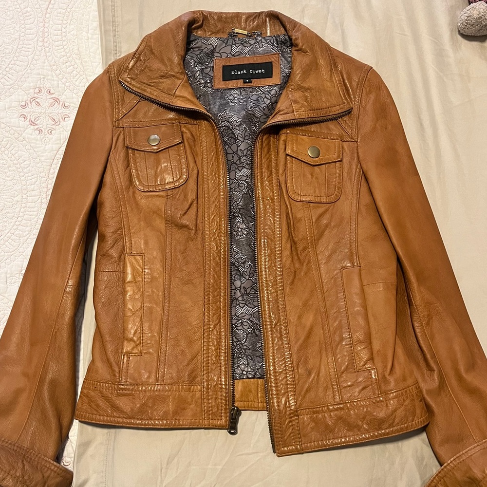Never worn genuine leather jacket